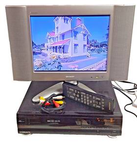 Magnavox Vr9965at01 Video Cassette Recorder With Remote And Rca Cord