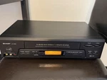 Sharp Vcr Model: VC-H965U Vhs Player/recorder-no Remote-tested, Works Used. Price: $52.00.