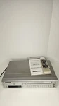 Sylvania SRD2900 Vcr-dvd Combo 4 Head Hi-fi Silver, Region 1, Remote Parts Only Used. Price: $25.00.