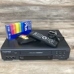 Mitsubishi Video Cassette Recorder HS-U448 W/remote, Rca Cables, Blank Vhs Tape Used. Price: $85.00.