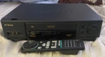 Hitachi VT-M294A Vhs Vcr With Remote Control; Model# VT-RM294A Unspecified. Price: $79.99.