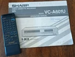 Sharp Remote Control G0337GE With Owners Operator Manual For VC-A601U Used. Price: $14.25.