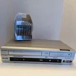 Sylvania DVR90VE Recorder Dvd-rw/r Vcr 4 Head, Progressive Scan & Rca Cables Used. Price: $77.99.