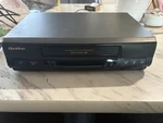 Quasar VHQ-450 Vhs Player Omnivision 4-HEAD Hi-fi + 20 Tapes Used. Price: $75.00.