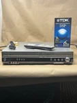 Panasonic DMR-ES35V Vcr Dvd Recorder Player Dubbing W Remote Av Cables Tape Used. Price: $139.95.