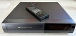 Hitachi Vcr VT-M132A Vhs Player Video Recorder With Remote Controller VT-RM132A Used. Price: $32.00.