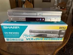 Sharp DV-RW340U Dvd Vcr Combo Recorder Vhs Player Remote, Cables, Manual Used. Price: $129.00.