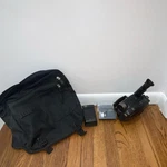 Jvc Camcorder W/ Sony Tape, Rechargeable Battery Adapter, Bag Used. Price: $30.00.