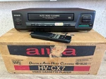 Aiwa HV-CX7 Vhs Video Cassette Player Pal Mesecam Tested Working + Remote Box Used. Price: $200.00.
