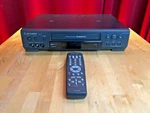 Mitsubishi HS-U748 S-vhs Player / Hi-fi Precision Turbodrive Original Remote Used. Price: $175.00.