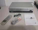 Zenith Vcr VCM321 With Remote And Cables Booklet Used. Price: $85.00.