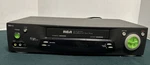 Rca Vcr Video Cassette Recorder Vhs Tape Player VR706HF For Parts Not Working. Price: $19.99.