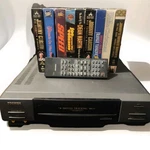 Toshiba Vhs Vcr, "4 Digital Tracking Auto Head Cleaning System." 9 Free Tapes. Used. Price: $30.00.