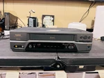 Symphonic SL2940 4-HEAD Vhs Video Cassette Recorder Used. Price: $30.00.