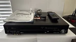 Panasonic DMR-EZ485V Dvd Vcr Combo Recorder Vhs To W/ Remote Great Cond Used. Price: $200.00.