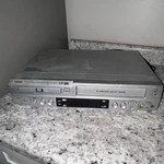 Sanyo DVW-7200 Dvd Vcr Combo Player 4-HEAD Hi-fi Vhs Recorder Tested Used. Price: $64.99.
