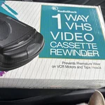 Radioshack 1-WAY Vhs Cassette Rewinder W/ Auto Stop, Cat. No. 44-1200 Open. Price: $45.00.
