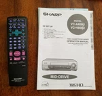 Sharp Vcr Vhs Remote RRMCG1197AJSA With Owners Manual For No VCA400U VCH800U Used. Price: $20.00.
