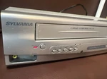 Sylvania SRDD495 Vcr/dvd Combo Player - Parts Repair, Powers On, No Eject For. Price: $9.00.
