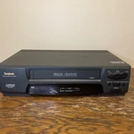 Symphonic SV206G Vhs Player Stereo Vcr Video Cassette For Parts Untested. Price: $12.00.
