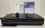 Samsung DVD-V6700 Vcr Combo Vhs Player With Cables, Remote And Manuals Used. Price: $110.00.
