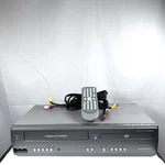 DV225MG9 Vcr Magnavox Combo Player Vhs 4 Head Remote & Cords / Tested Works Used. Price: $99.99.