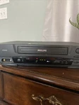 Vintage Magnavox Video Cassette Recorder/player Model VRT442 Black Tested Works Used. Price: $50.00.