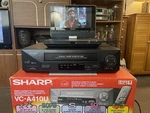 Sharp VC-A410U Head Vcr / Vhs Player & Remote Ex. Cond. Monitor Not Included) Used. Price: $150.00.