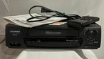 1990 Sylvania Video Cassette Recorder Model # 2965LF- Owners Manual & Remote Used. Price: $34.95.